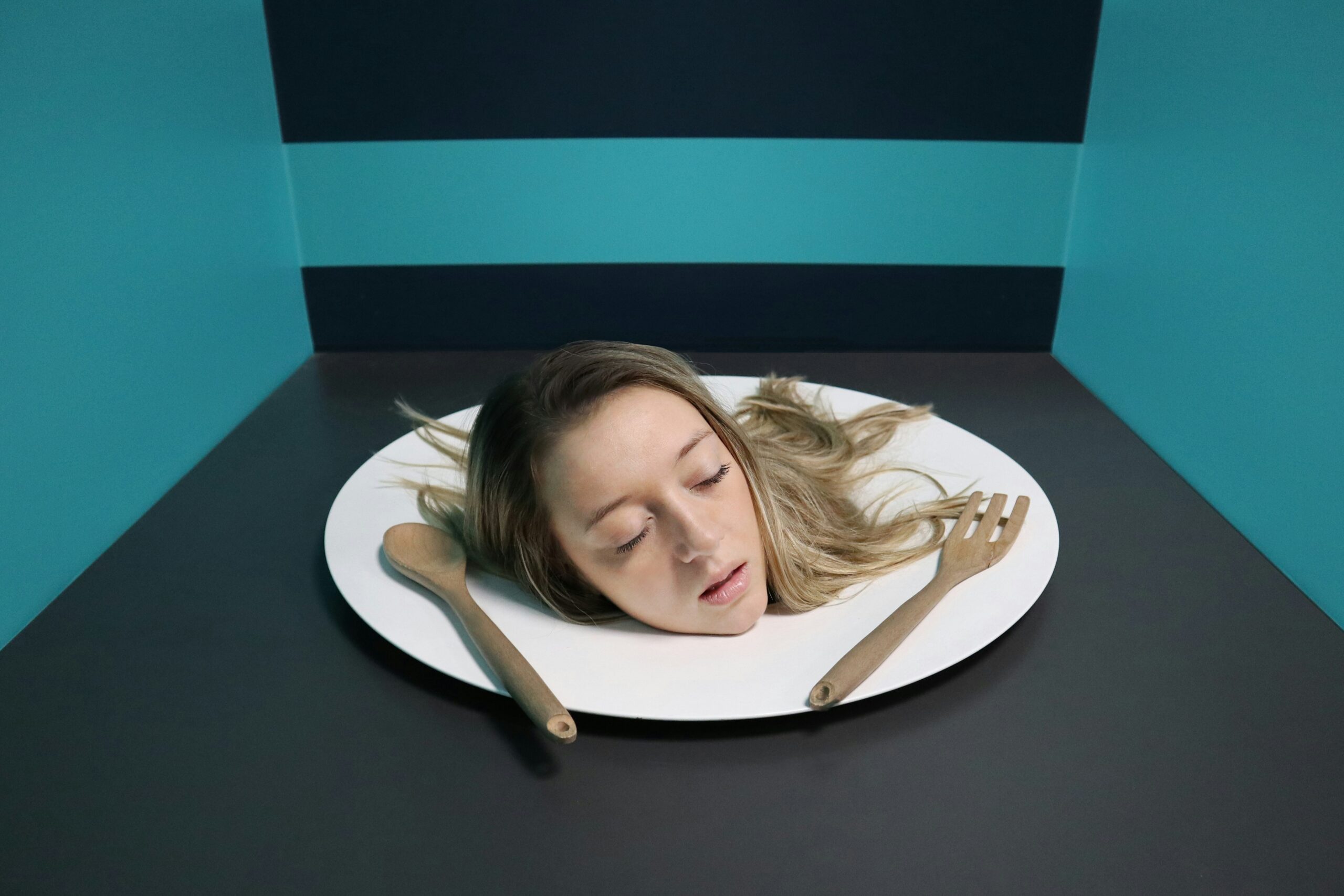 Person sleeping with medical-grade tape over closed mouth