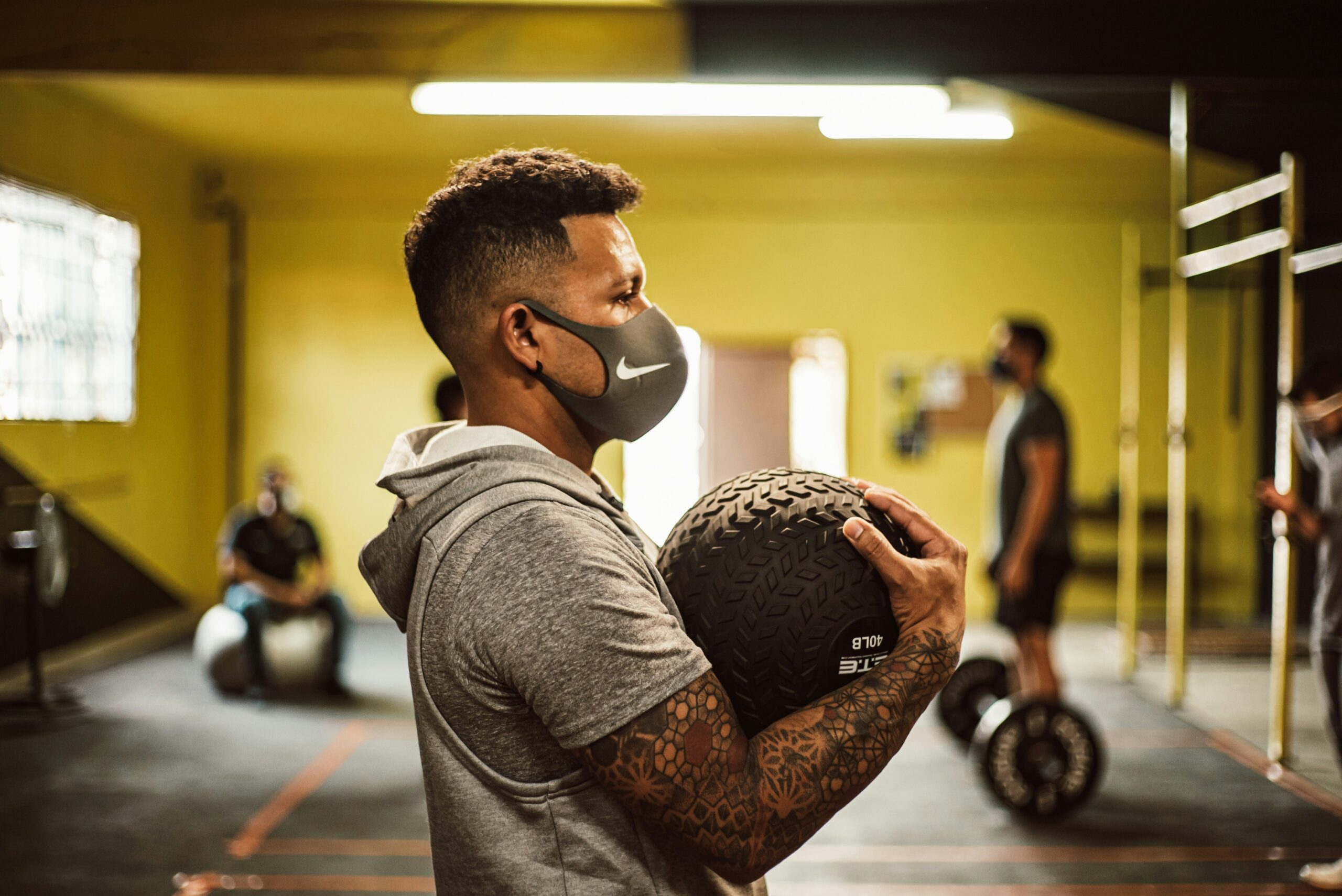 Professional athlete using airflow-controlled breathing during training