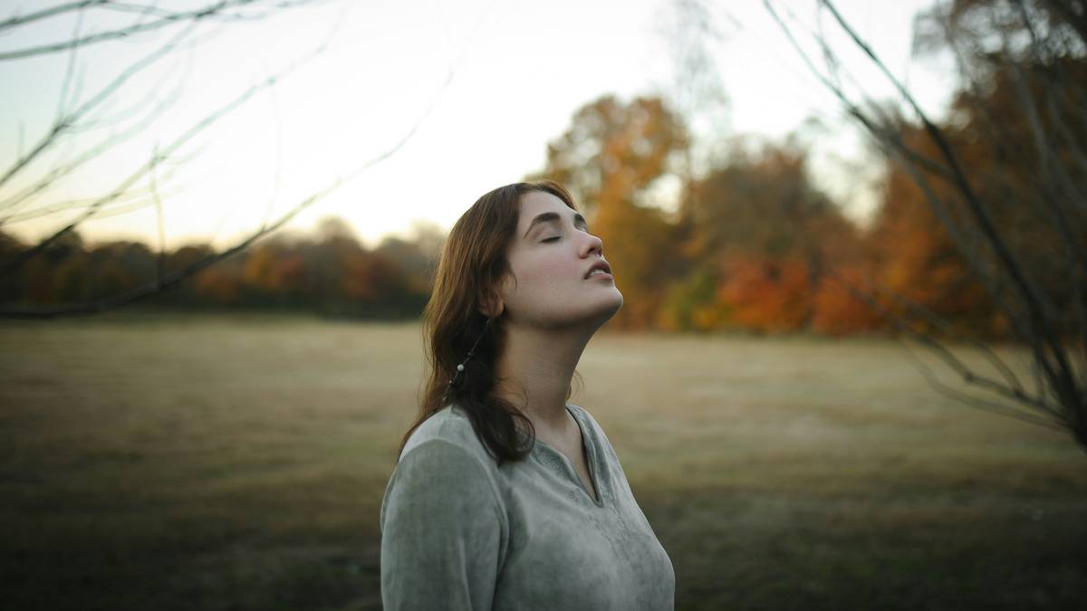 Demonstration of diaphragmatic breathing technique with hands placed correctly.